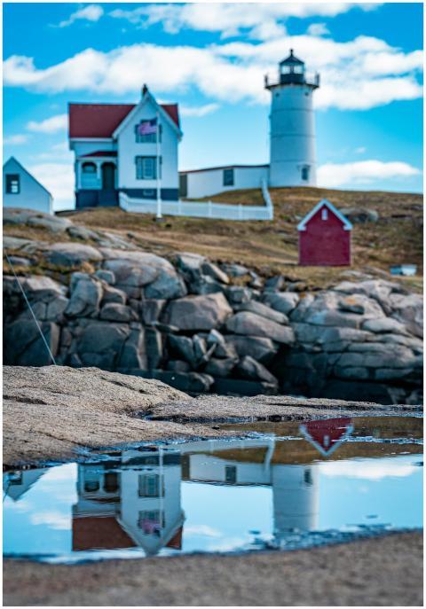 Scenic view of Nubble Lighthouse and its reflectio
