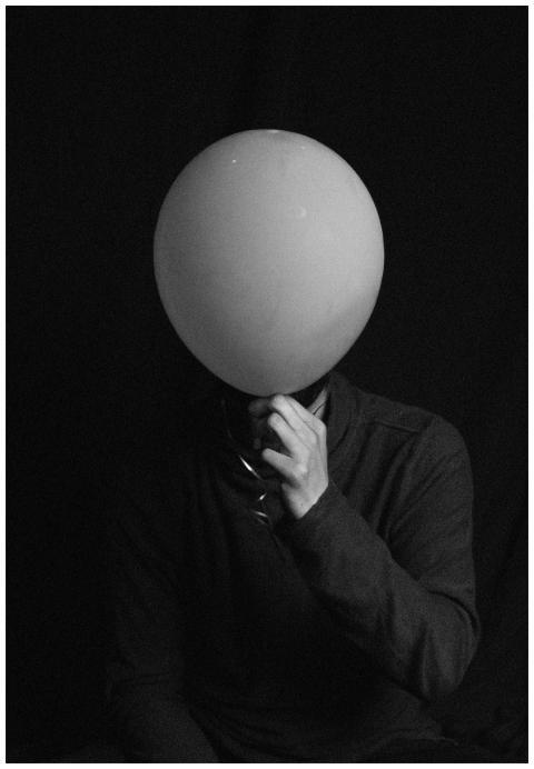 A striking monochrome portrait featuring a person