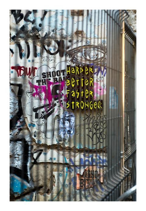 Vibrant graffiti art on a corrugated metal wall, s