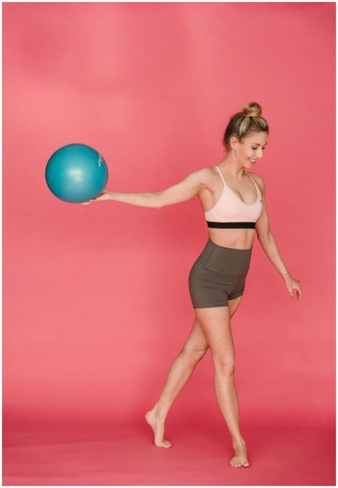 Full body of slim positive female athlete wearing