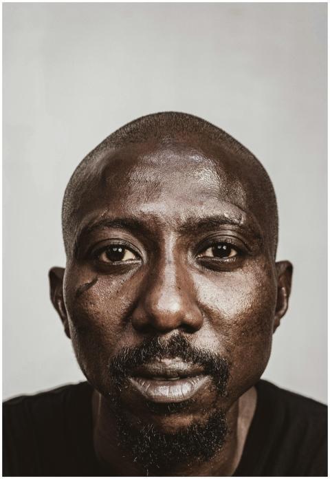 Intense close-up portrait of an African man with a