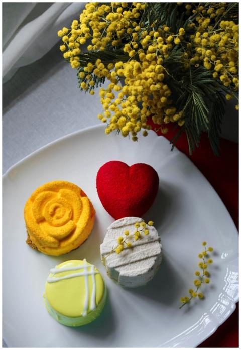A vibrant pastry arrangement featuring cupcakes an