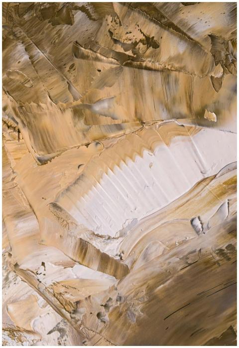 A close-up view of a textured surface with warm, e