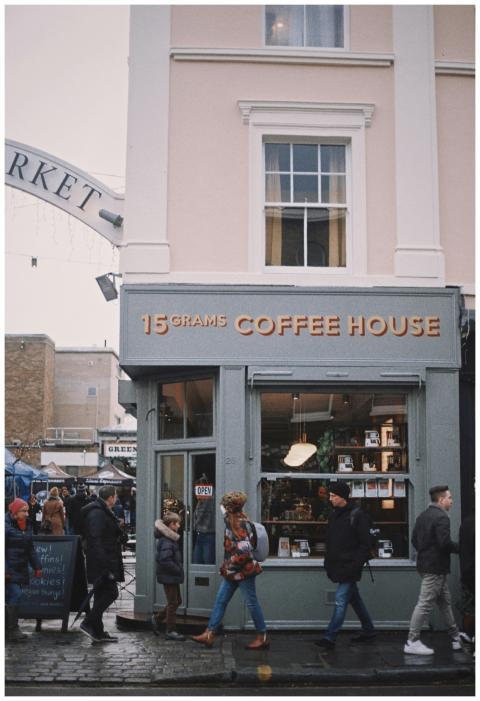 A bustling London street with people walking past