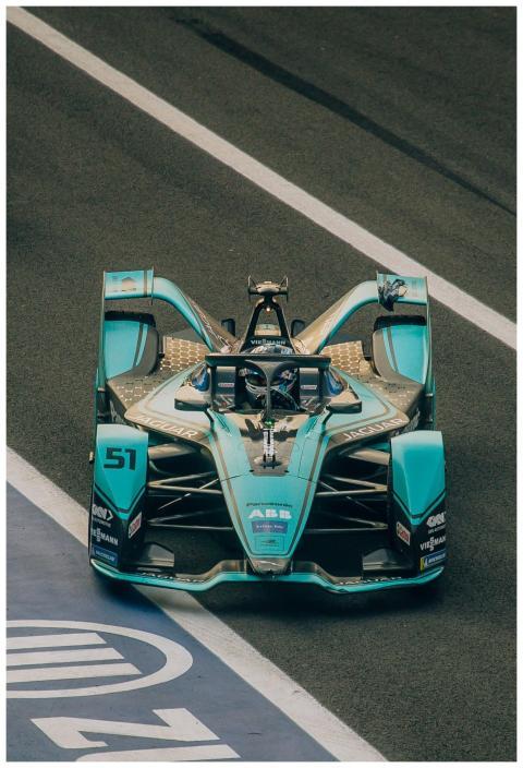 Close-up shot of a Formula E race car at a race tr