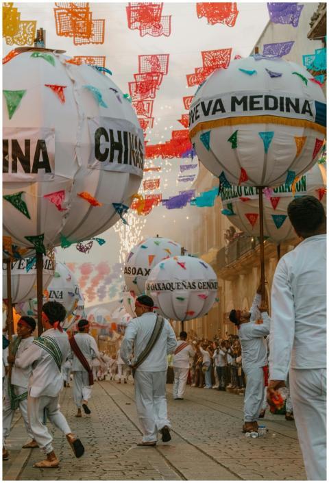 Vibrant street parade with people in traditional a