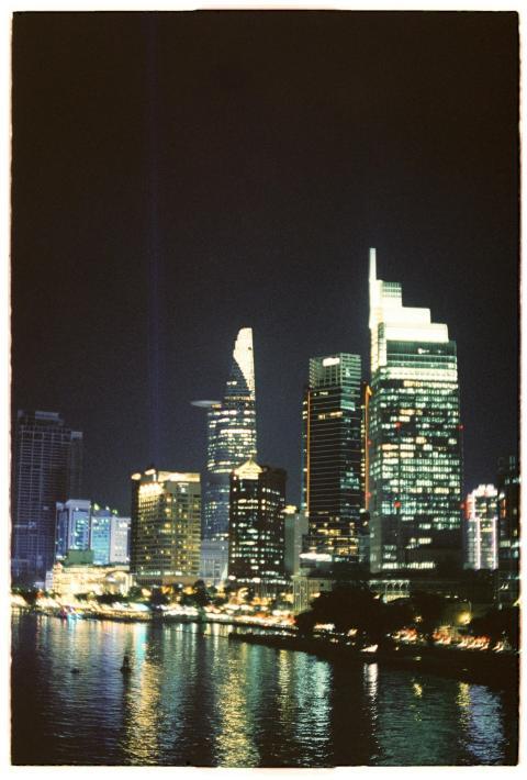 Illuminated Ho Chi Minh City skyline with skyscrap