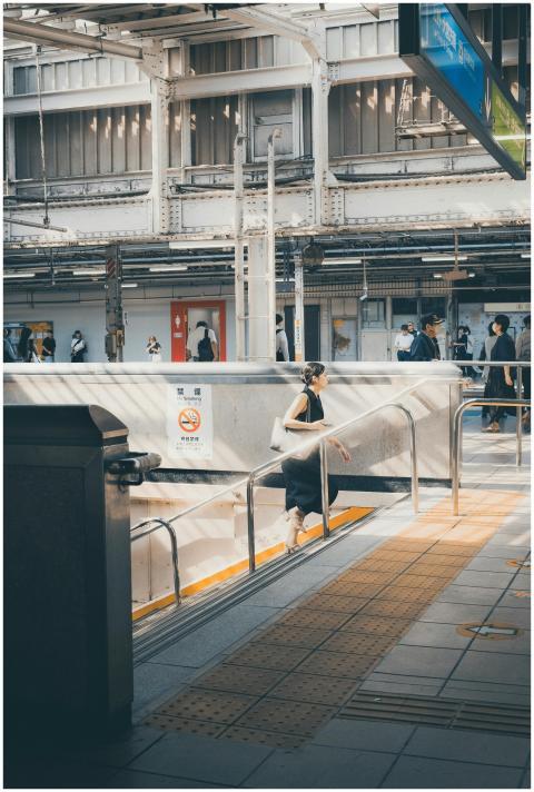 Commuters at a train station platform in Tokyo, Ja