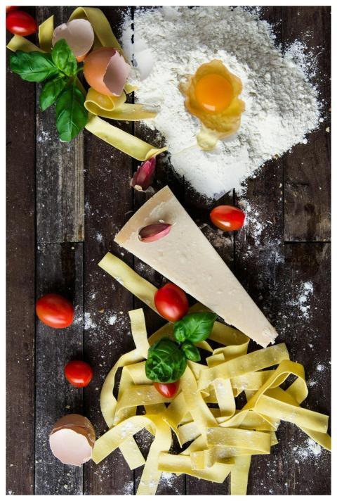 Top view of fresh pasta ingredients including flou