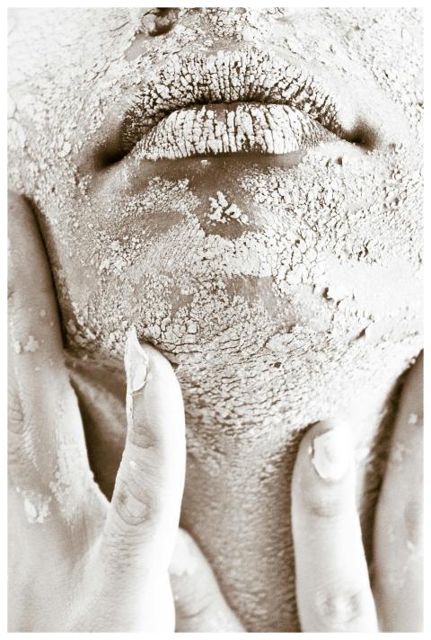 Artistic close-up of a woman's textured skin empha