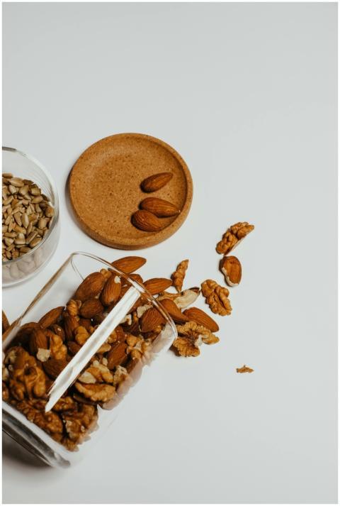 A collection of almonds, walnuts, and sunflower se