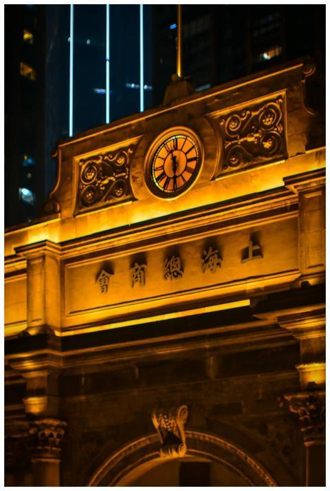 A historic clock tower beautifully illuminated at