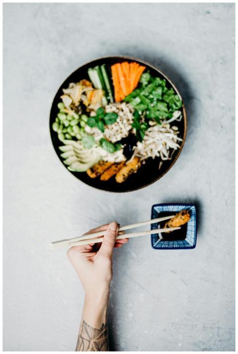 A vibrant Asian meal with vegetables and shrimp, f