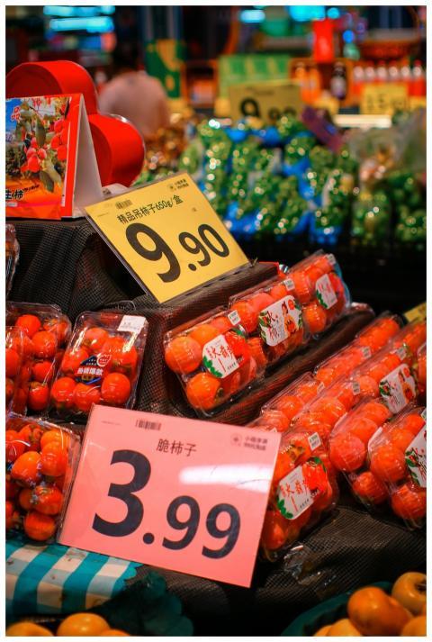 Colorful market stall displaying fresh fruits and