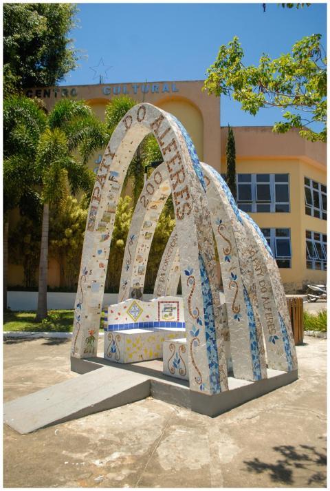 Vibrant mosaic arch monument at a cultural center