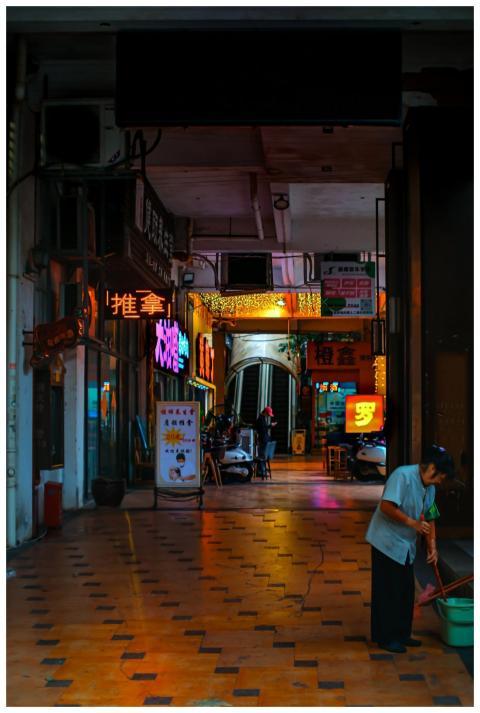 Colorful urban scene with neon lights and a person