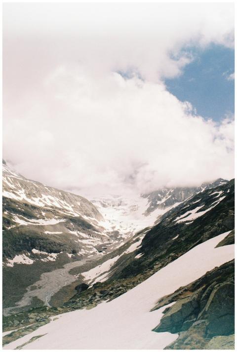 Scenic view of a majestic snowy mountain under a c