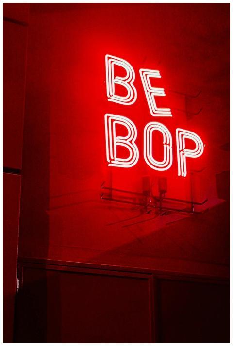 Bright red neon 'Be Bop' sign in Buenos Aires bar,