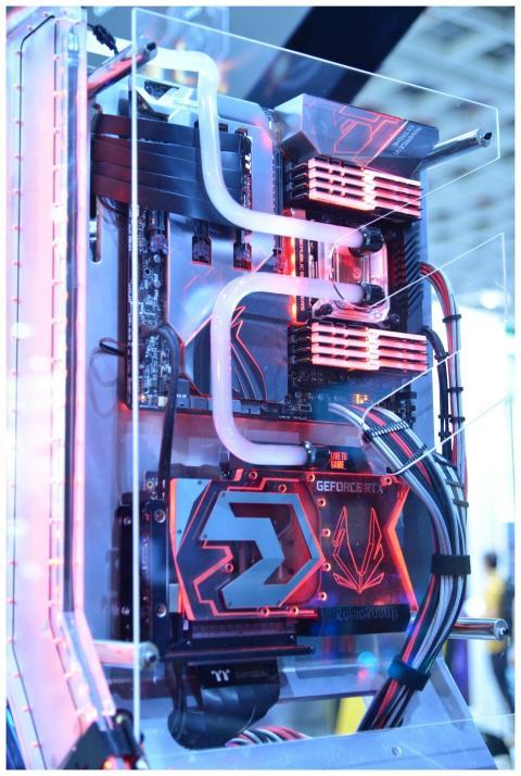 Close-up view of a custom gaming PC with water coo