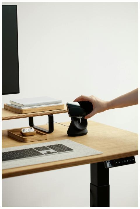 Minimalist workspace featuring a wireless charging