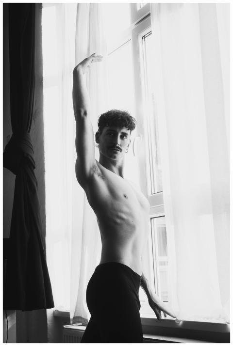 Artistic black and white portrait of a male ballet