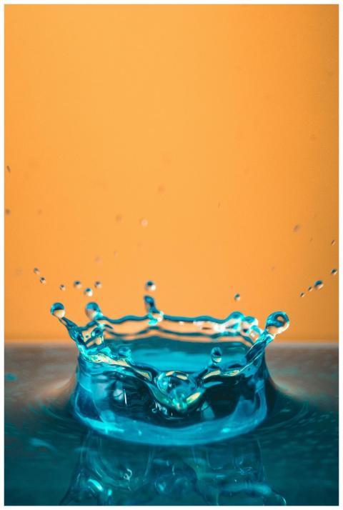 Stunning close-up of a turquoise water splash with