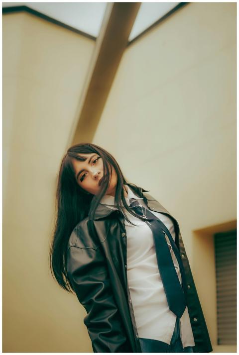 Fashion-forward young woman posing confidently in