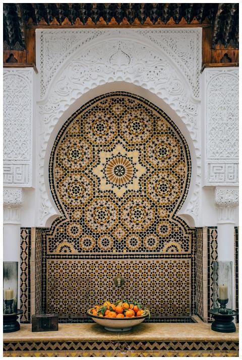 Aged shrine decorated with traditional ornaments i