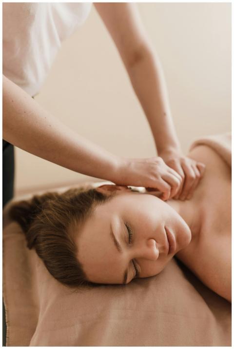 Woman enjoying a soothing massage in a serene spa