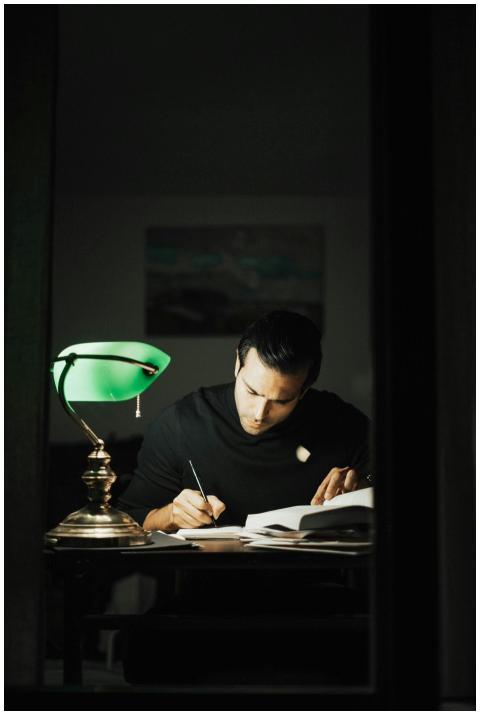 Concentrated young male wearing black turtleneck t