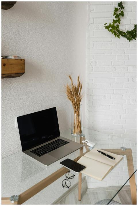 Modern workspace setup with a laptop and smartphon