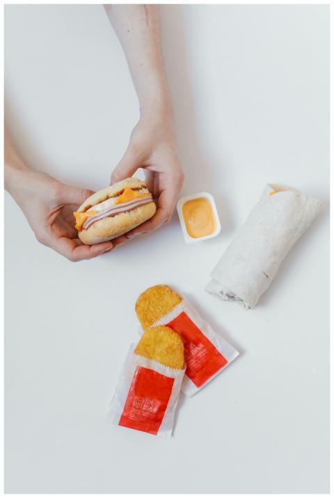 Delicious breakfast featuring a burrito, hash brow