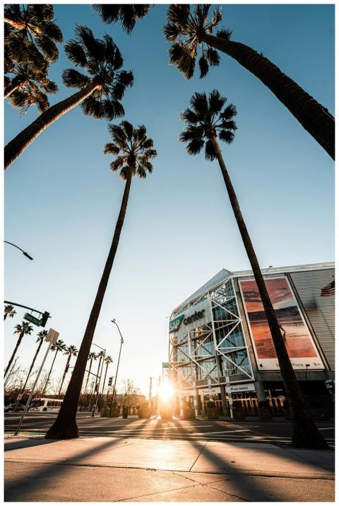 A vibrant sunset captures the SAP Center framed by