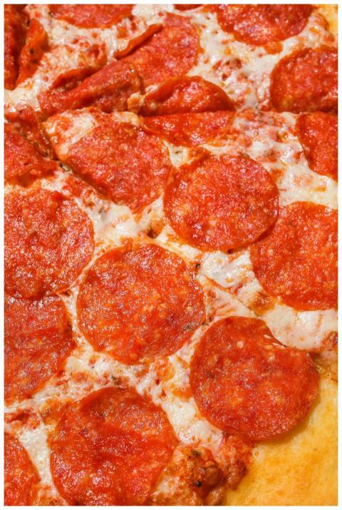 Mouth-watering pepperoni pizza with melted cheese