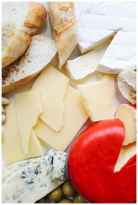 Delicious assortment of cheeses and breads, perfec