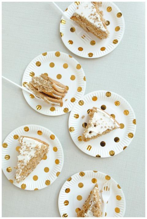 Delicious slices of cake on polka dot plates, perf