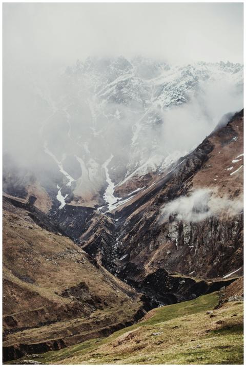 A breathtaking view of fog enveloping the rugged K