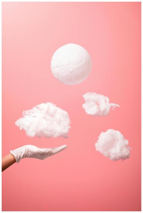 An artistic composition of floating clouds and han