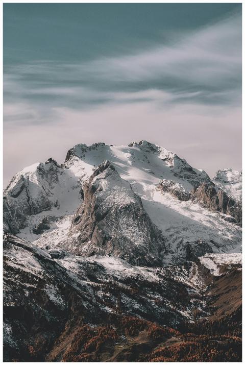 A breathtaking view of a snow-capped mountain rang