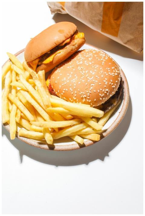 Tasty fast food spread featuring burgers and fries