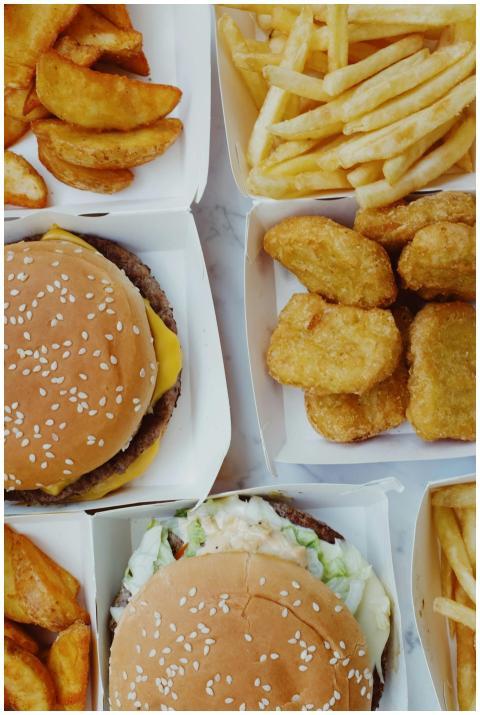 Closeup of delicious junk food consisting of burge