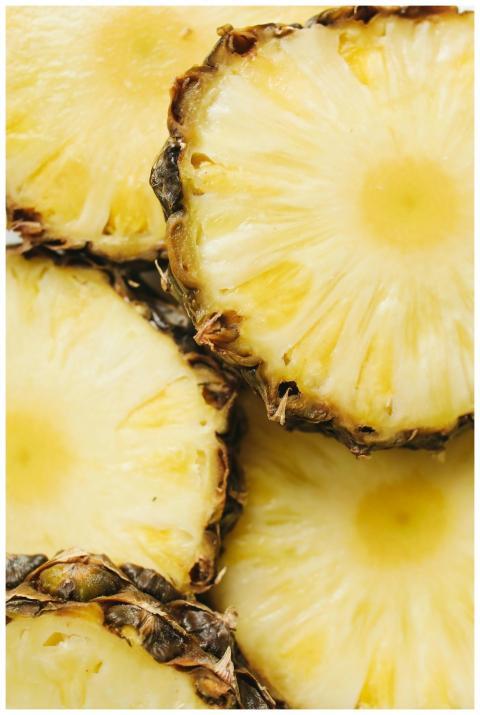 Vibrant close-up of fresh pineapple slices display