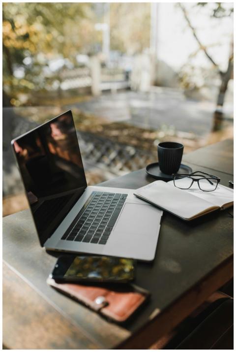 A serene outdoor workspace setup featuring a lapto