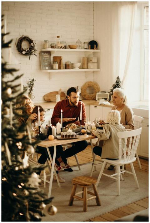 Warm family gathering around a festive dinner tabl