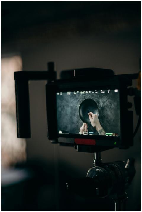 Close-up of a video production setup featuring a m