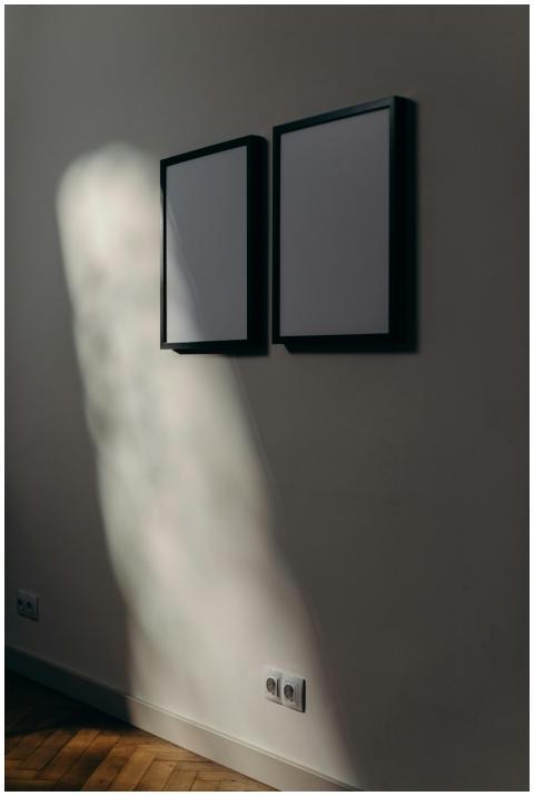 Minimalist contemporary art wall with framed poste