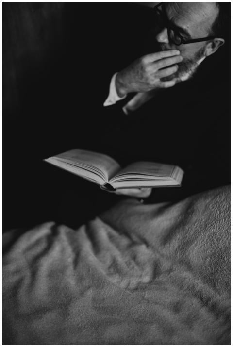 A contemplative monochrome portrait of an adult ma