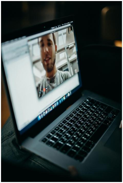 Close-up of a person engaged in a video call on a