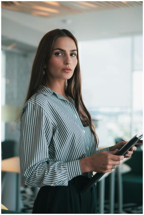 Portrait of a businesswoman holding documents in a
