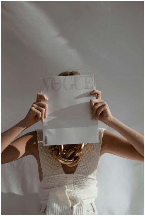 Unrecognizable female with big chain on neck stand